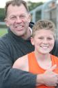 Jonas and his dad celebrate his win
